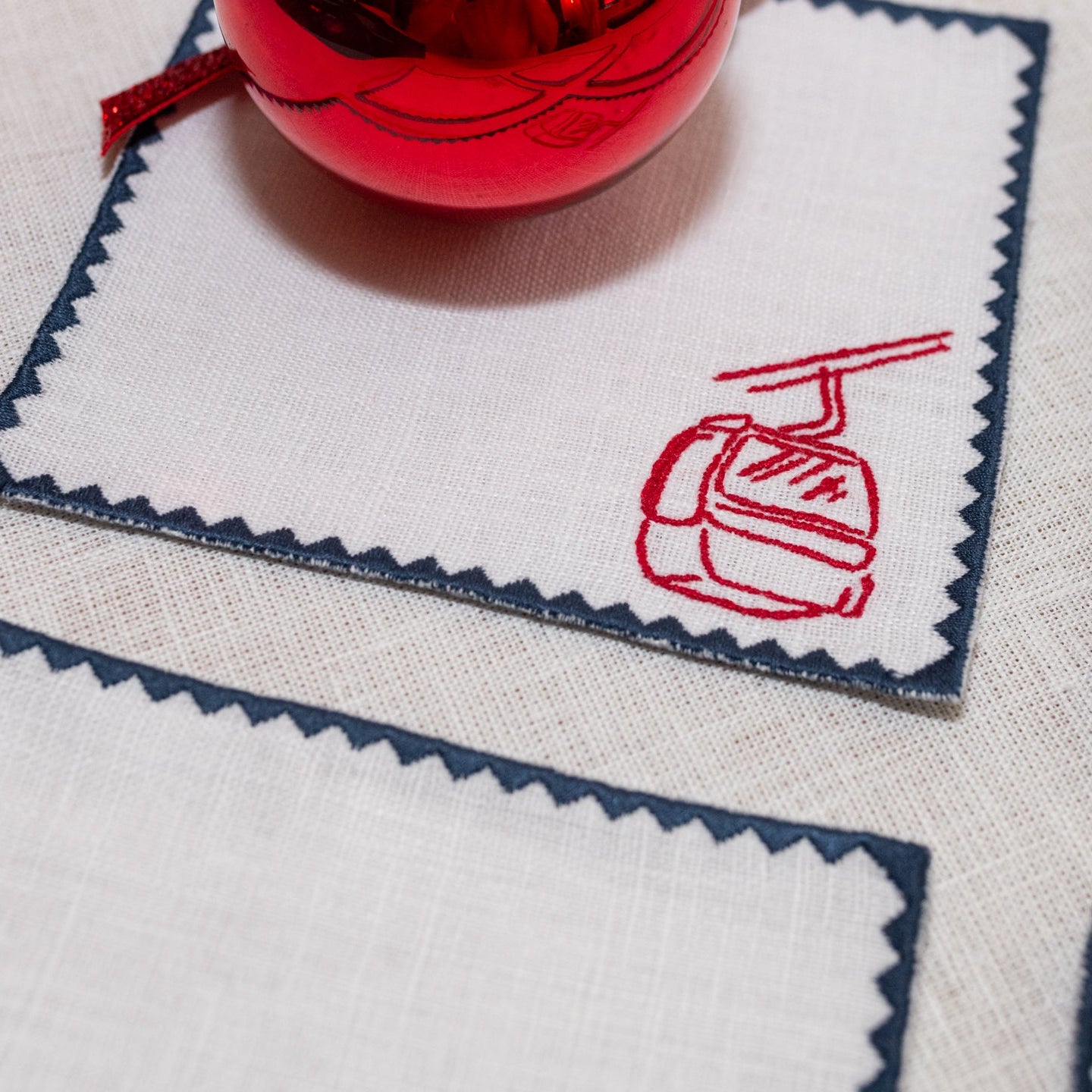 Ski Collection Cocktail Napkins | White with Midnight Blue and Red Embroidery — Set of 4